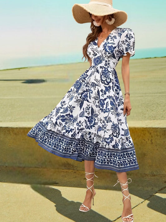 Avalee | Elegantes festliches Damenkleid mit Blumenmuster, Überschussausschnitt und Laternenhülsen | Multicolor