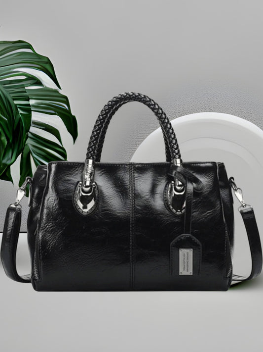 Celin | Elegante Leder-Dufflebag mit geräumigem Innenraum und robusten Griffen | Schwarz