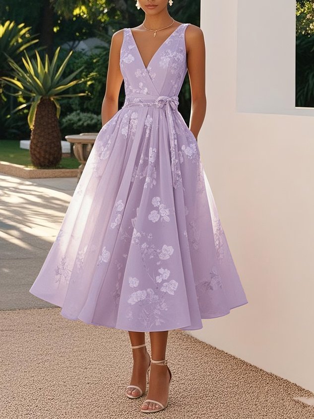 Damen Elegantes Blumenkleid mit tiefem V-Ausschnitt und Taillengürtel Echo Archiv 7