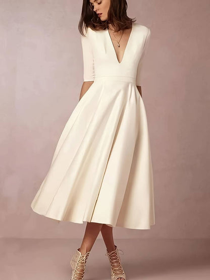 Elegantes Kleid mit V-Ausschnitt für Damen 1