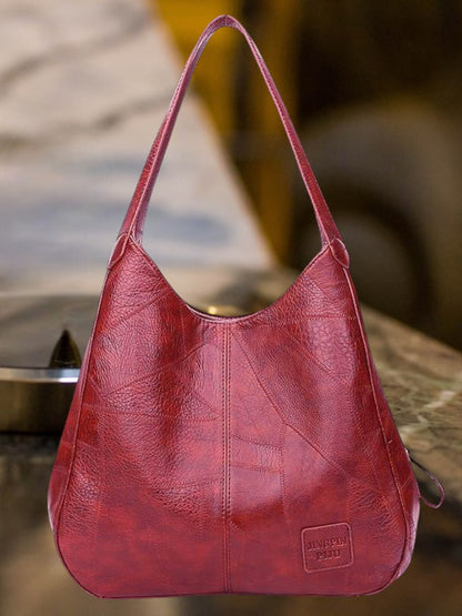 Elin | Schwarze Ledertasche Damen aus hochwertigem Leder mit geräumigem Innenraum und robustem Griff  | Rot