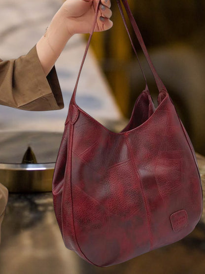 Elin | Schwarze Ledertasche Damen aus hochwertigem Leder mit geräumigem Innenraum und robustem Griff  | Rot 2