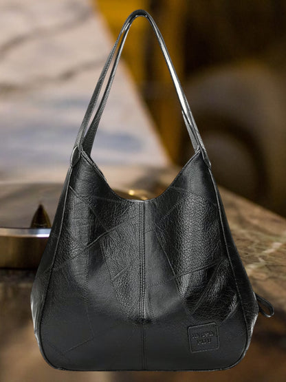 Elin | Schwarze Ledertasche Damen aus hochwertigem Leder mit geräumigem Innenraum und robustem Griff  | Schwarz