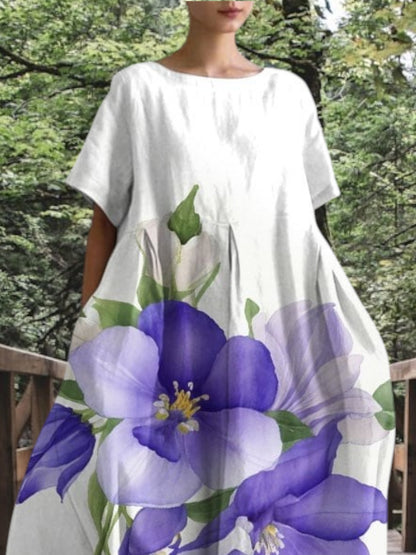 Frida | Lila Blumendruck Damen Kleid mit einer entspannten Passform und kurzen Ärmeln für den Sommer | Lila 2