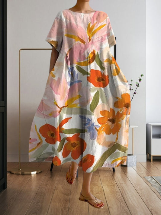 Vibeke | Elegantes Damenkleid mit Blumendruck aus leichtem Stoff, V-Cut, entspanntem Schnitt, ohne Ärmel, perfekt für den Sommer | Orange